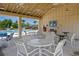 Relax in the shaded poolside pavilion with tables and chairs for gatherings and refreshments at 757 Cherry Blossom Dr., Murrells Inlet, SC 29576