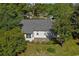 Back of the house with brick patio and nice landscaping at 802 Mockingbird Ct., Murrells Inlet, SC 29576