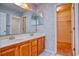 Bathroom boasts dual sinks, vanity, and a large walk-in closet at 802 Mockingbird Ct., Murrells Inlet, SC 29576