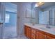 Bathroom features a dual sink vanity and classic mirror at 802 Mockingbird Ct., Murrells Inlet, SC 29576