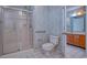 Bathroom view includes a glass shower and white toilet at 802 Mockingbird Ct., Murrells Inlet, SC 29576
