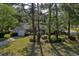 Charming front yard and shade trees frame the house at 802 Mockingbird Ct., Murrells Inlet, SC 29576