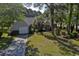 This is a beautifully landscaped front yard with mature palm trees at 802 Mockingbird Ct., Murrells Inlet, SC 29576