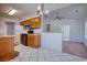 Open kitchen layout with modern appliances, light countertops, and tile floors at 802 Mockingbird Ct., Murrells Inlet, SC 29576
