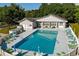 Community pool has plenty of seating and tables and umbrellas at 802 Mockingbird Ct., Murrells Inlet, SC 29576