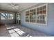 Cozy sunroom with large windows and an outdoor view at 802 Mockingbird Ct., Murrells Inlet, SC 29576