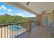 Relaxing balcony with views of pool, lake and surrounding scenery at 8029 Wacobee Dr., Myrtle Beach, SC 29579