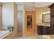 Bathroom featuring walk-in shower, soaking tub, and vanity with granite countertop at 8029 Wacobee Dr., Myrtle Beach, SC 29579