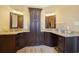 Bathroom with dual vanities, granite countertops, and ample storage space at 8029 Wacobee Dr., Myrtle Beach, SC 29579