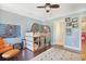 This ' bedroom features wood floors, a play tent, and nice light at 8029 Wacobee Dr., Myrtle Beach, SC 29579