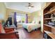 Comfortable bedroom with hardwood floors, natural light, and ample space at 8029 Wacobee Dr., Myrtle Beach, SC 29579