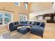 Cozy and bright living room with large sectional sofa and access to patio at 8029 Wacobee Dr., Myrtle Beach, SC 29579