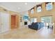 Open living space with soaring ceilings, built-ins, and large windows for natural light at 8029 Wacobee Dr., Myrtle Beach, SC 29579