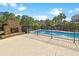 Outdoor fireplace, hot tub and in-ground pool with fountain feature, perfect for entertaining at 8029 Wacobee Dr., Myrtle Beach, SC 29579