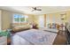 Spacious playroom with hardwood floors, a ceiling fan and tons of natural light at 8029 Wacobee Dr., Myrtle Beach, SC 29579