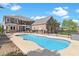 Spacious backyard featuring a fenced in pool, patio, and beautifully landscaped yard at 8029 Wacobee Dr., Myrtle Beach, SC 29579