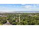 Expansive aerial view of a lush, green residential area near the ocean at 844 Wachesaw Rd., Murrells Inlet, SC 29576