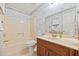 Bathroom featuring a combination tub/shower, single sink vanity and decorative wallpaper at 844 Wachesaw Rd., Murrells Inlet, SC 29576