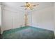 Bright bedroom with double closets, neutral walls, and ceiling fan at 844 Wachesaw Rd., Murrells Inlet, SC 29576