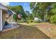 Spacious front yard showcasing the home and its surroundings on a sunny day at 844 Wachesaw Rd., Murrells Inlet, SC 29576