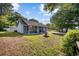 Well-maintained front yard featuring lush green grass and mature trees at 844 Wachesaw Rd., Murrells Inlet, SC 29576