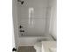 Clean bathroom featuring a tub with shower and tile flooring at 905 Inlet Keys St., Murrells Inlet, SC 29576