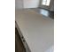 Expansive quartz kitchen island providing ample counter space and a sleek, modern look at 905 Inlet Keys St., Murrells Inlet, SC 29576