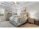 Comfortable bedroom with neutral tones and plenty of natural light from the window with blinds at 9060 Abingdon Dr., Myrtle Beach, SC 29579