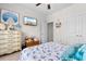 Bedroom with nautical decor featuring a TV, dresser and large window at 9060 Abingdon Dr., Myrtle Beach, SC 29579