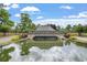 Welcome to Plantation Lakes: A stunning water feature and lush landscaping make for an inviting community entrance at 9060 Abingdon Dr., Myrtle Beach, SC 29579