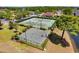 Community sport courts featuring tennis courts, basketball court, and well-maintained landscaping at 9060 Abingdon Dr., Myrtle Beach, SC 29579