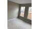 Bedroom with natural light streaming through the home's windows at 907 Inlet Keys St., Murrells Inlet, SC 29576