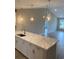 Kitchen featuring quartz countertops, stainless steel appliances, and designer pendant lighting at 907 Inlet Keys St., Murrells Inlet, SC 29576