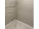 Laundry room with washer hookup and marble-patterned flooring at 907 Inlet Keys St., Murrells Inlet, SC 29576