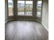 Living room with floor-to-ceiling windows offering great lake views at 907 Inlet Keys St., Murrells Inlet, SC 29576