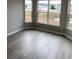 Living room with expansive windows providing plenty of natural light at 907 Inlet Keys St., Murrells Inlet, SC 29576