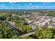 Panoramic aerial showcasing Conway's historic downtown, riverfront, and lush surroundings under a vast blue sky at 908 Oglethorpe Dr., Conway, SC 29527