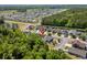 Aerial view of the community featuring green trees, blue skies, and a lake at 908 Oglethorpe Dr., Conway, SC 29527