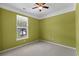 Cozy bedroom with a window view and carpeted floors at 908 Oglethorpe Dr., Conway, SC 29527