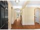 Inviting foyer with beautiful hardwood floors, archways, and a view into the home at 908 Oglethorpe Dr., Conway, SC 29527