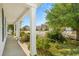 A cozy front porch with views of a well-kept neighborhood and lush greenery at 908 Oglethorpe Dr., Conway, SC 29527