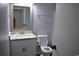 Bathroom featuring updated vanity, mirror, toilet, and a towel rack at 950 Forestbrook Rd. # C3, Myrtle Beach, SC 29579