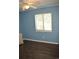 This bedroom features durable floors, light blue walls and natural light at 950 Forestbrook Rd. # C3, Myrtle Beach, SC 29579