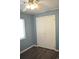 Cozy bedroom with a window, closet, ceiling fan, and laminate flooring at 950 Forestbrook Rd. # C3, Myrtle Beach, SC 29579