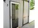 Exterior view of the glass front door of the townhome at 950 Forestbrook Rd. # C3, Myrtle Beach, SC 29579