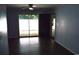 The living room boasts modern flooring and a private outdoor patio at 950 Forestbrook Rd. # C3, Myrtle Beach, SC 29579