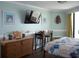 Nicely decorated bedroom featuring a dinette, flat-screen TV, and bright decorations at 9550 Shore Dr. # 1728, Myrtle Beach, SC 29572