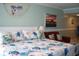 Comfortable bedroom features a king-sized bed and turtle themed decor at 9550 Shore Dr. # 1728, Myrtle Beach, SC 29572