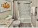 Bright bathroom features a granite vanity top, framed mirror, and a shower/tub combo with neutral accents at 9840 Queensway Blvd. # 1819, Myrtle Beach, SC 29572