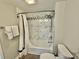 Bathroom featuring a shower and tub combination with marble tiling at 9840 Queensway Blvd. # 1819, Myrtle Beach, SC 29572